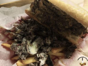 A bite of Jersey chipotle cheesesteak on West grove fries