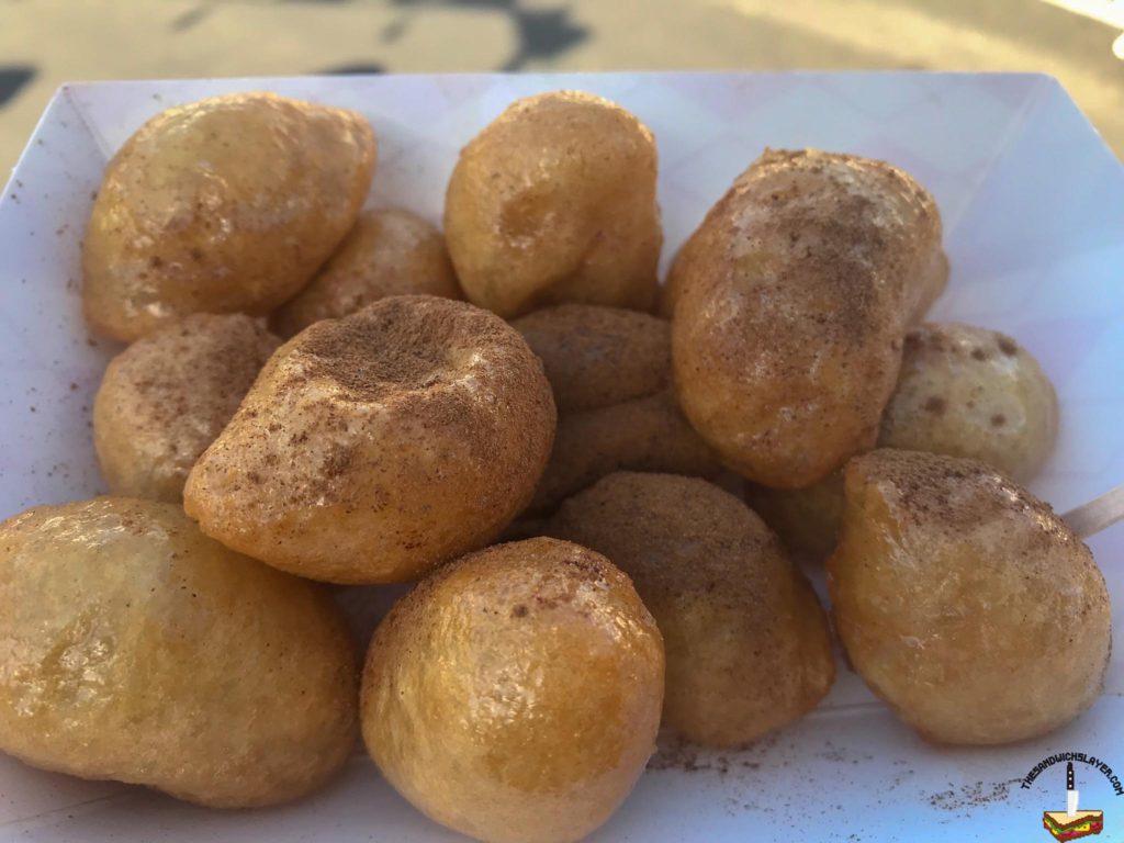 Freshly fried dough with honey syrup and cinnamon